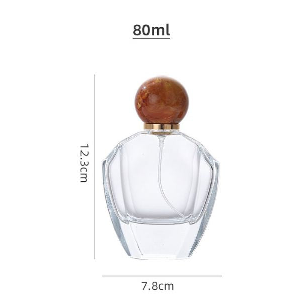 pb86-wholesale-80ml-perfume-glass-bottles-resin-bottle-cap-irregular-clear-perfume-bottles_0_600
